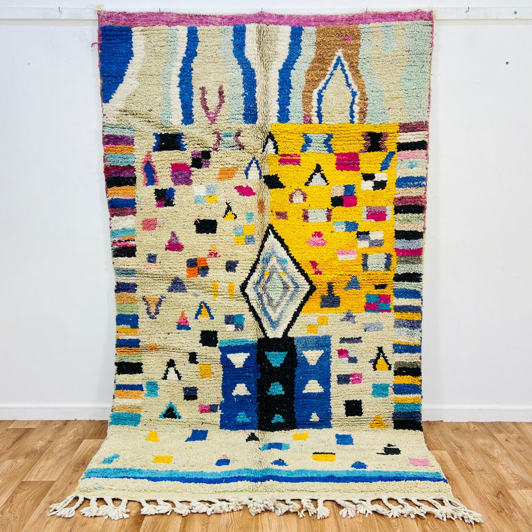 Vintage Moroccan wool rug with colorful geometric Berber pattern, handmade in Morocco