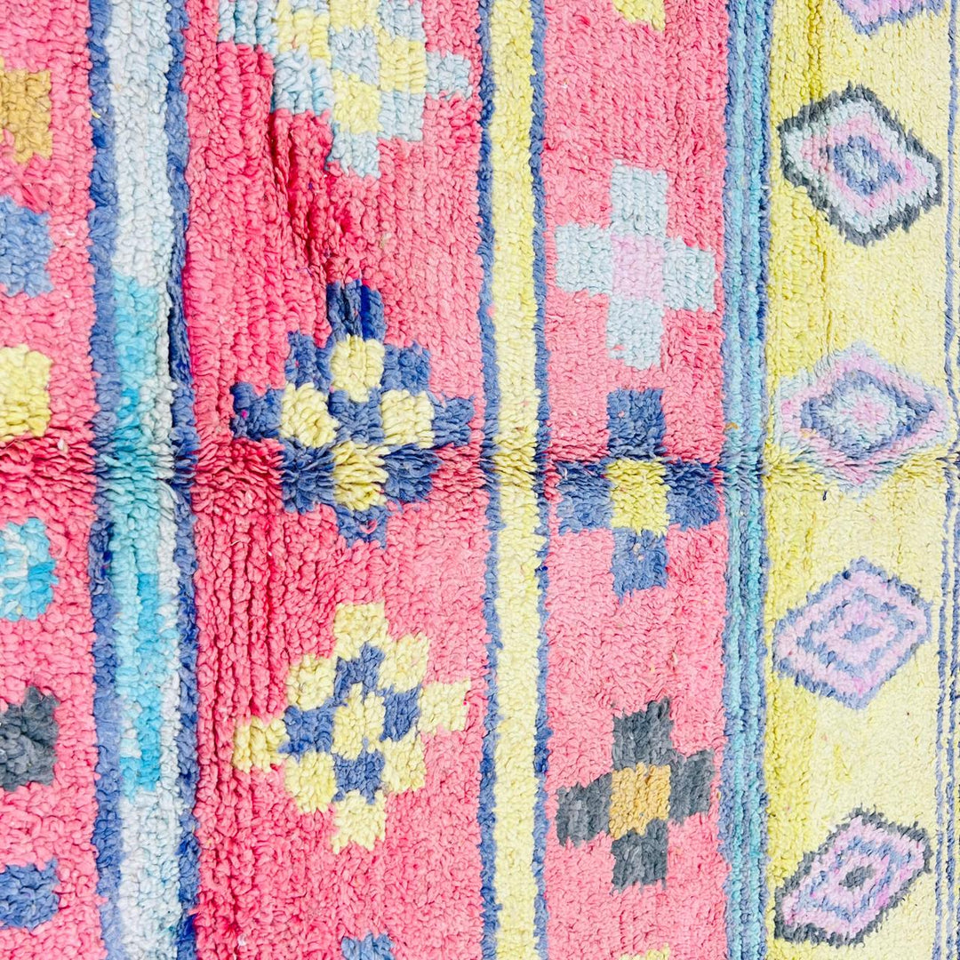 Vintage Moroccan wool rug with colorful Berber geometric patterns, handmade in Morocco