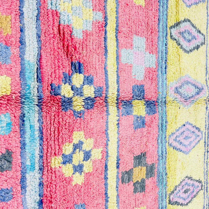 Vintage Moroccan wool rug with colorful Berber geometric patterns, handmade in Morocco