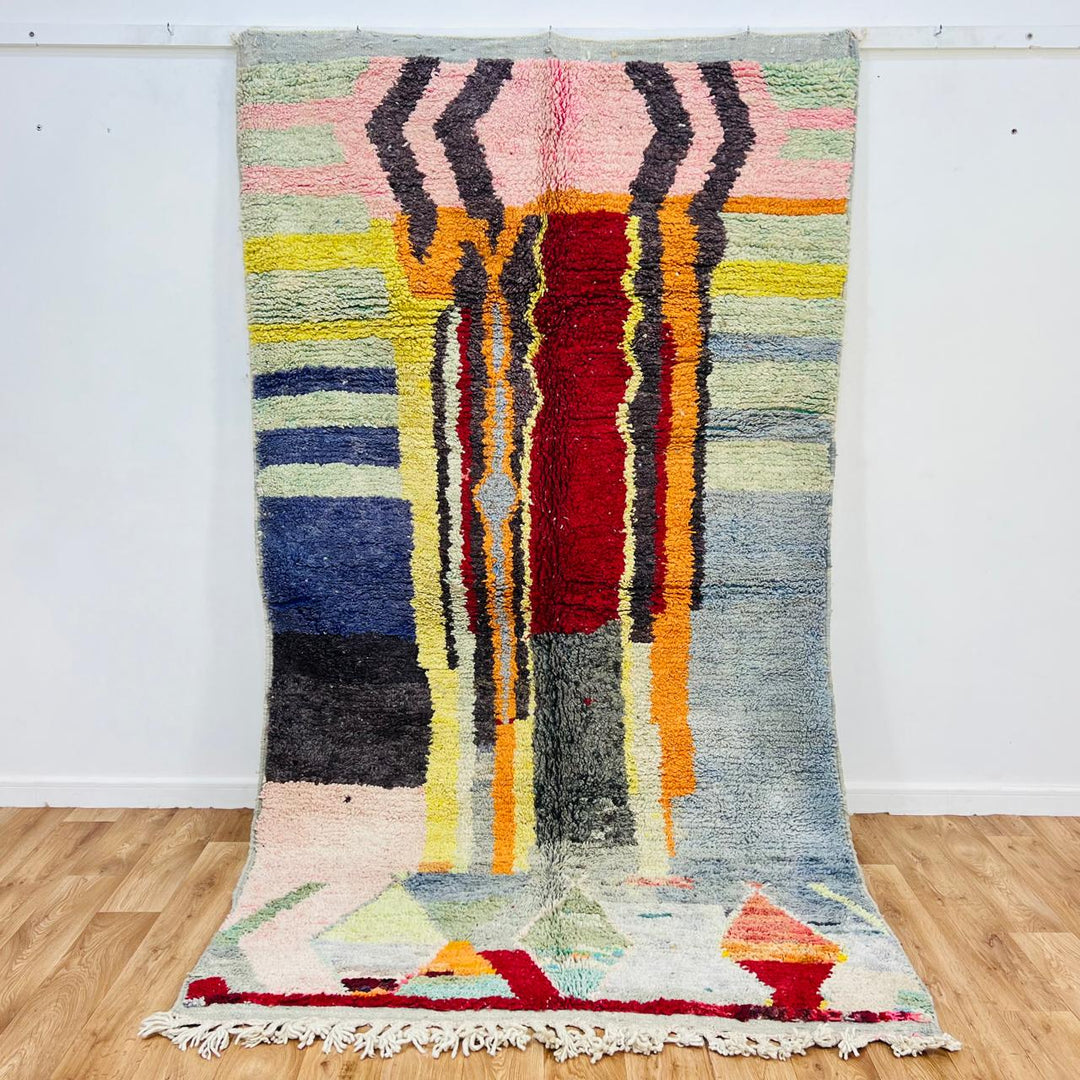 Vintage Moroccan wool rug 267x150 cm with abstract vertical design in blue, yellow, red and sage green – handmade Berber carpet from Morocco