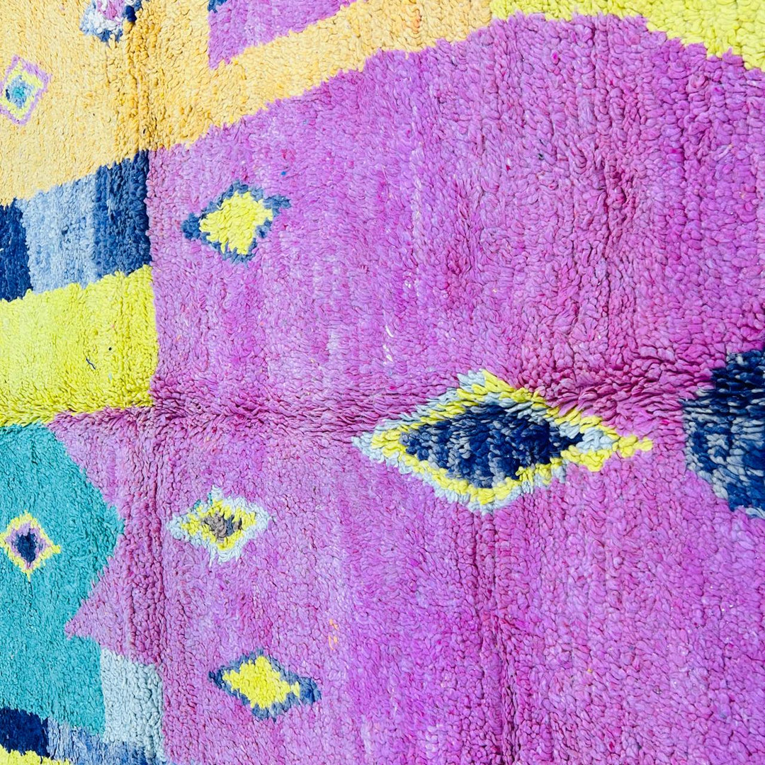 Vintage Moroccan wool rug with colorful geometric Berber pattern, handmade in Morocco