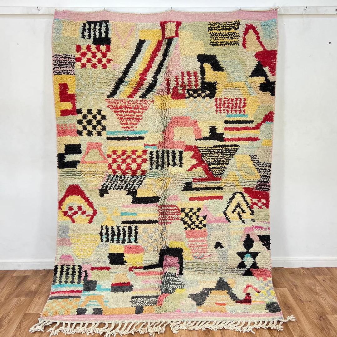 Vintage Moroccan wool rug with colorful patchwork Berber patterns, handmade in Morocco