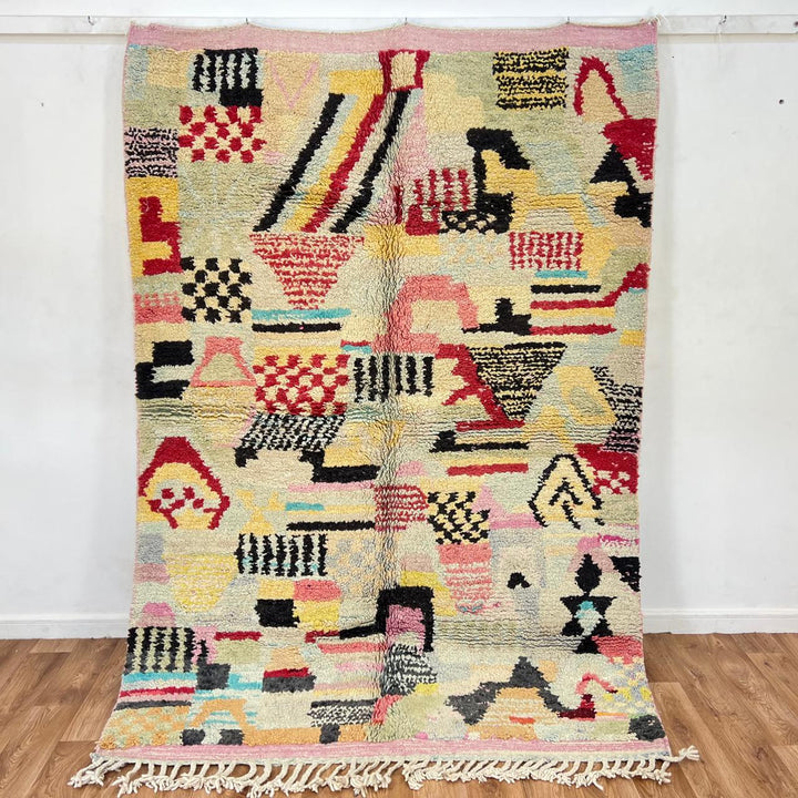 Vintage Moroccan wool rug with colorful patchwork Berber patterns, handmade in Morocco