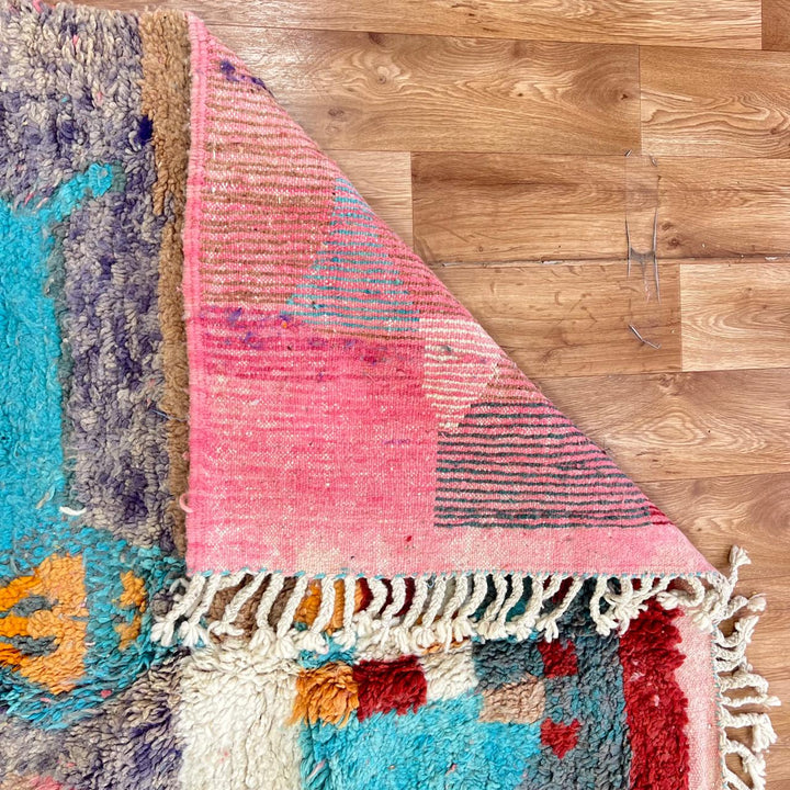 Vintage Moroccan golden wool rug with turquoise and tribal Berber symbols, handmade in Morocco