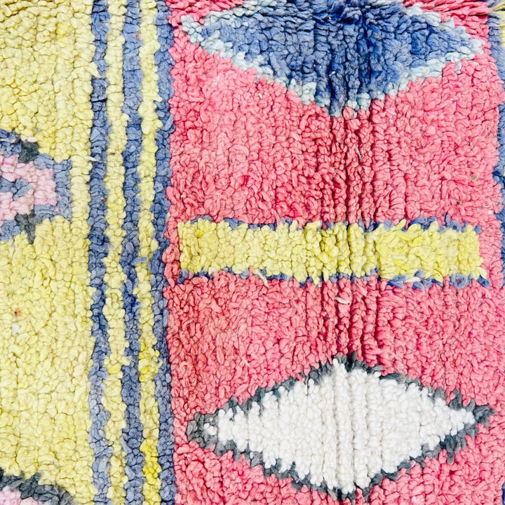 Vintage Moroccan wool rug with colorful Berber geometric patterns, handmade in Morocco