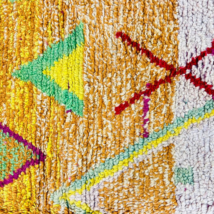 Vintage Moroccan wool rug with colorful Berber geometric symbols, handmade in Morocco