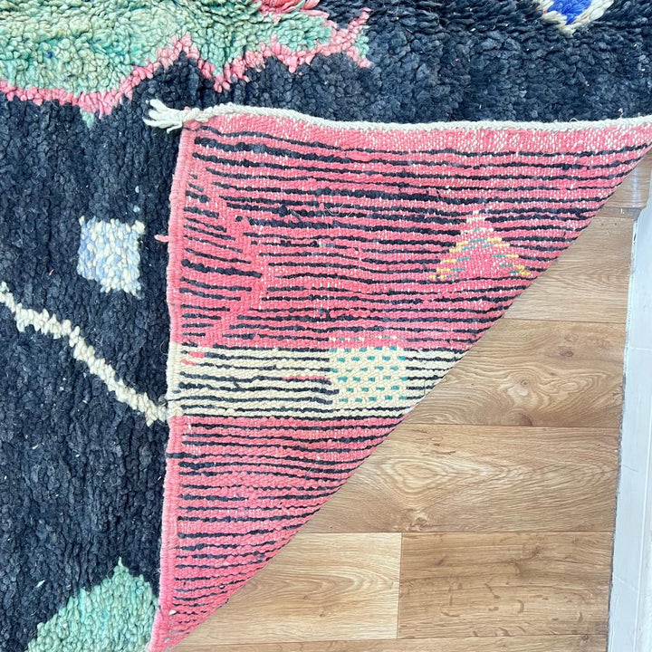 Vintage black Moroccan Berber rug with colorful tribal symbols 270x165 cm