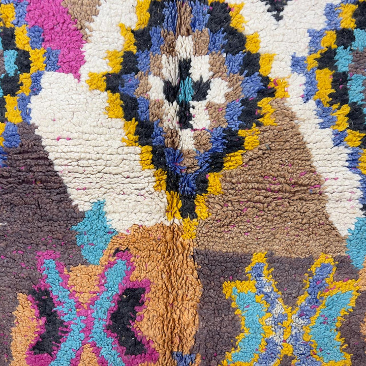 Vintage Moroccan wool rug 8.53x5.68 ft, handmade Berber shag carpet with colorful geometric tribal patterns in brown, pink, blue and mustard tones