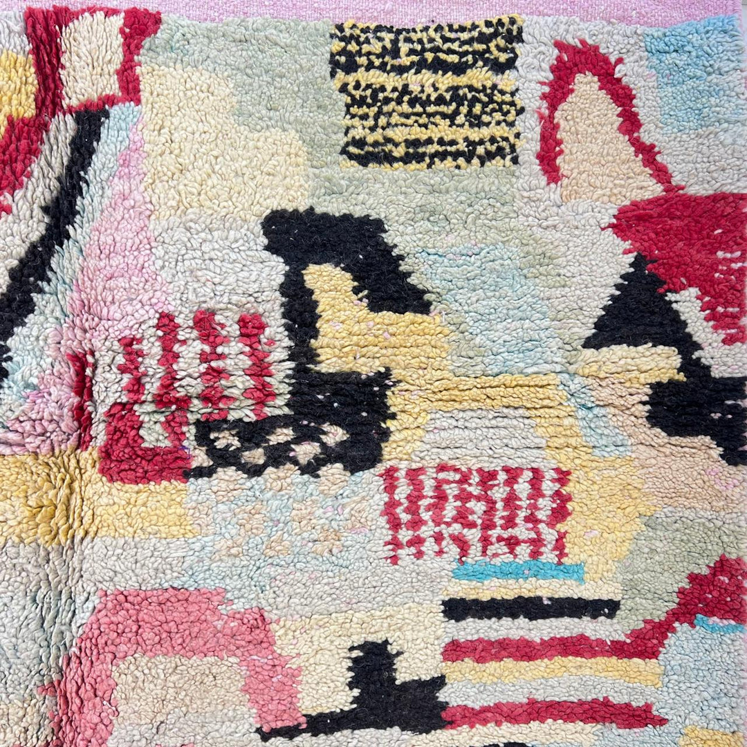 Vintage Moroccan wool rug with colorful patchwork Berber patterns, handmade in Morocco