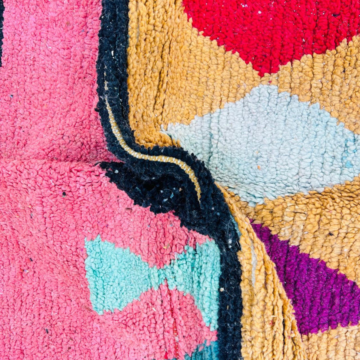 Handmade vintage Moroccan wool rug with colorful geometric Berber design. One-of-a-kind artisan rug, 290×155 cm.