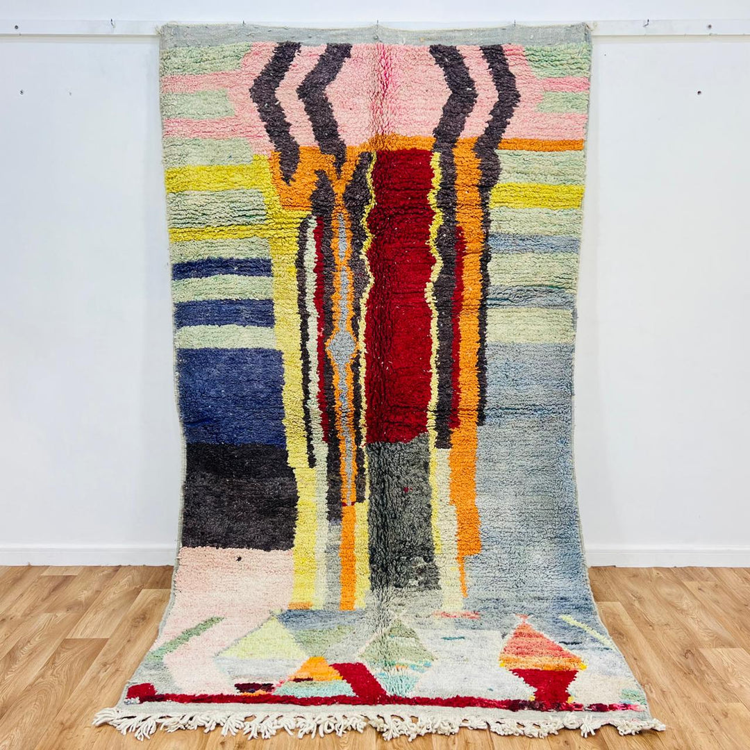 Vintage Moroccan wool rug 267x150 cm with abstract vertical design in blue, yellow, red and sage green – handmade Berber carpet from Morocco