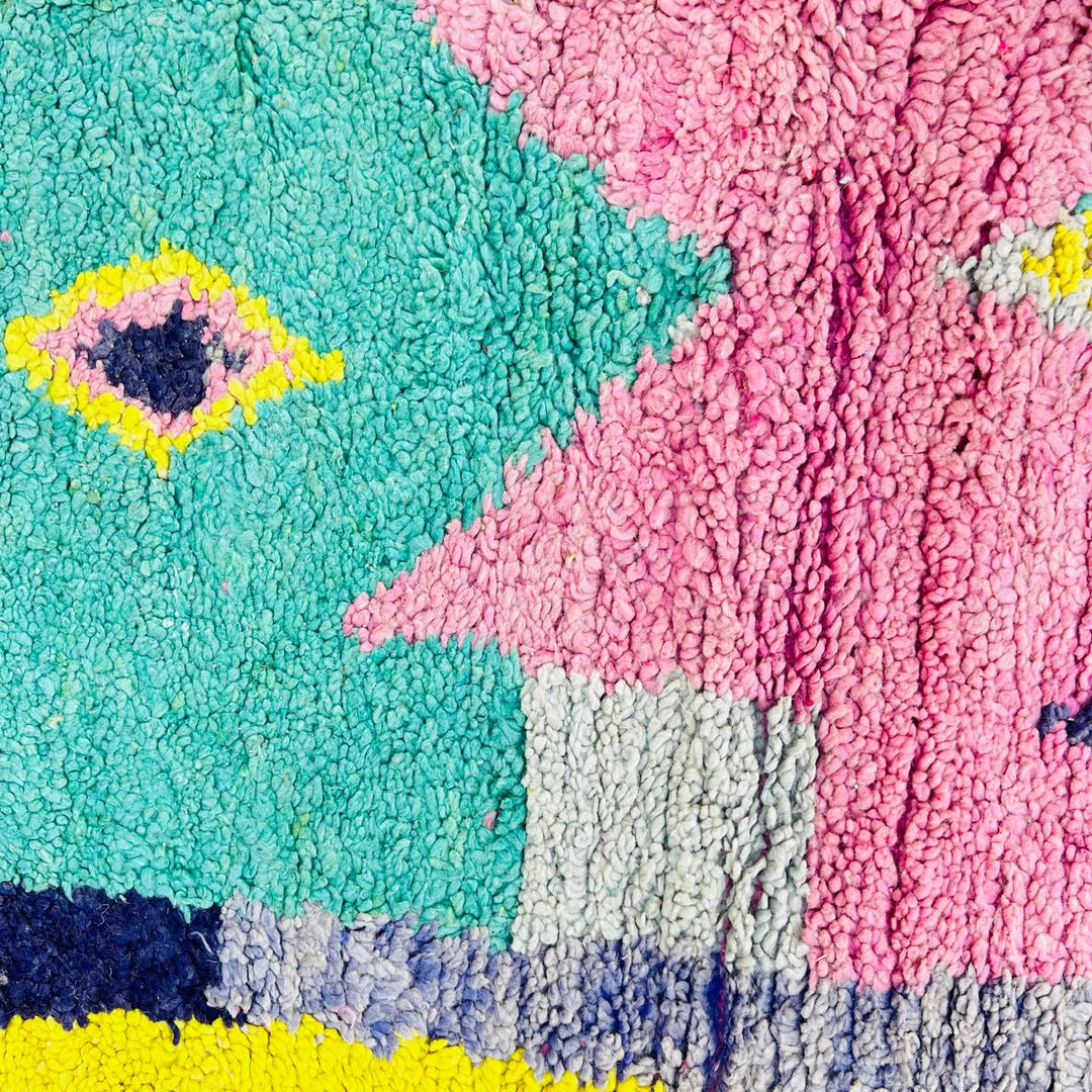 Vintage Moroccan wool rug with colorful geometric Berber pattern, handmade in Morocco