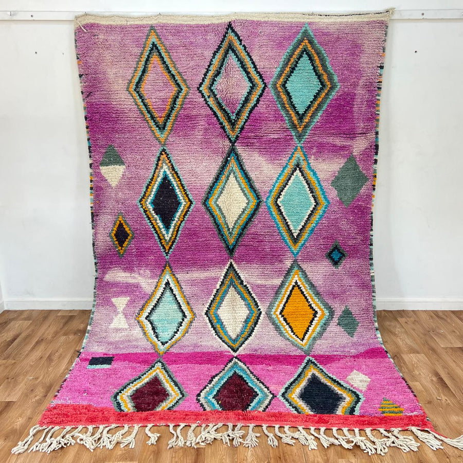 Vintage Moroccan wool rug with purple background and colorful diamond Berber patterns, handmade in Morocco
