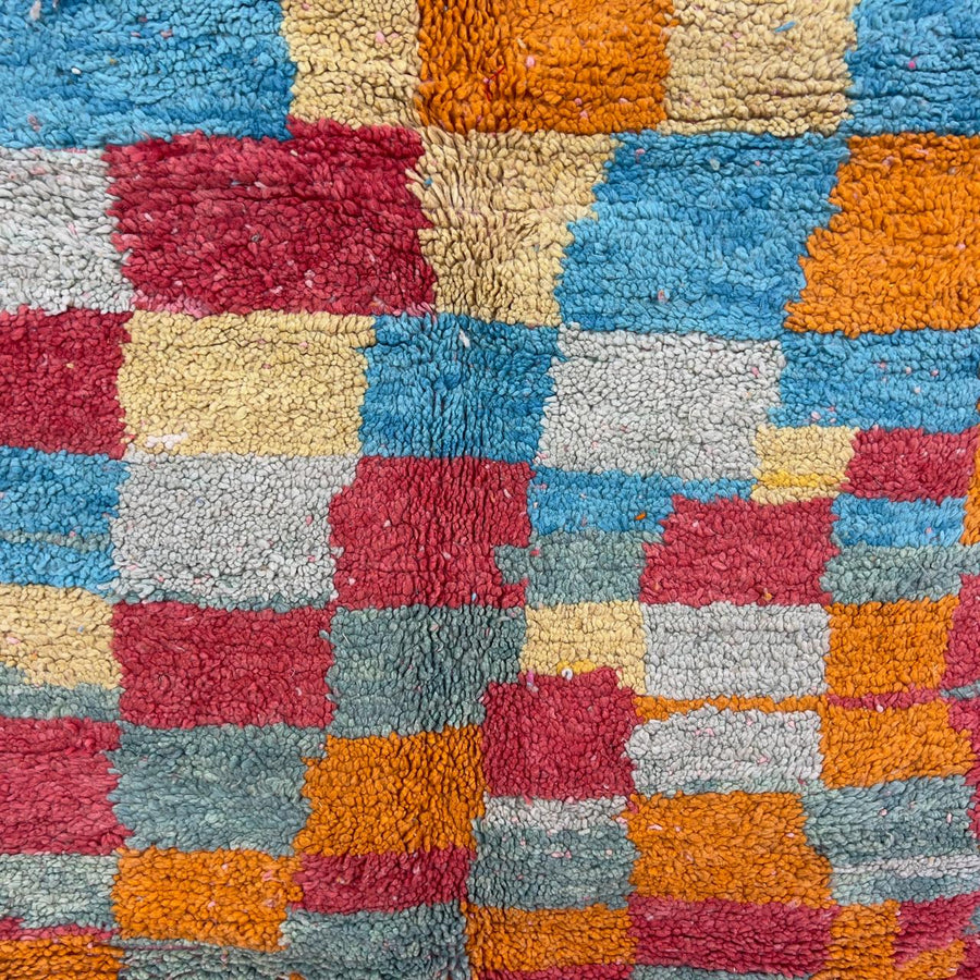 Vintage Moroccan wool rug 8.82 x 5.35 ft Rug 82 with colorful patchwork geometric design in turquoise, orange, pink, yellow and cream tones