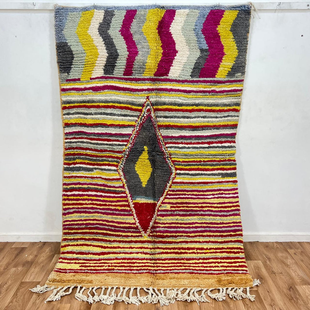 Vintage Moroccan wool rug with red, yellow, grey and ivory stripes and central diamond motif, handwoven Berber rug 235x152 cm