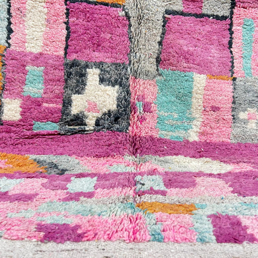 Vintage Moroccan Berber rug with pink abstract block design, handmade in Morocco