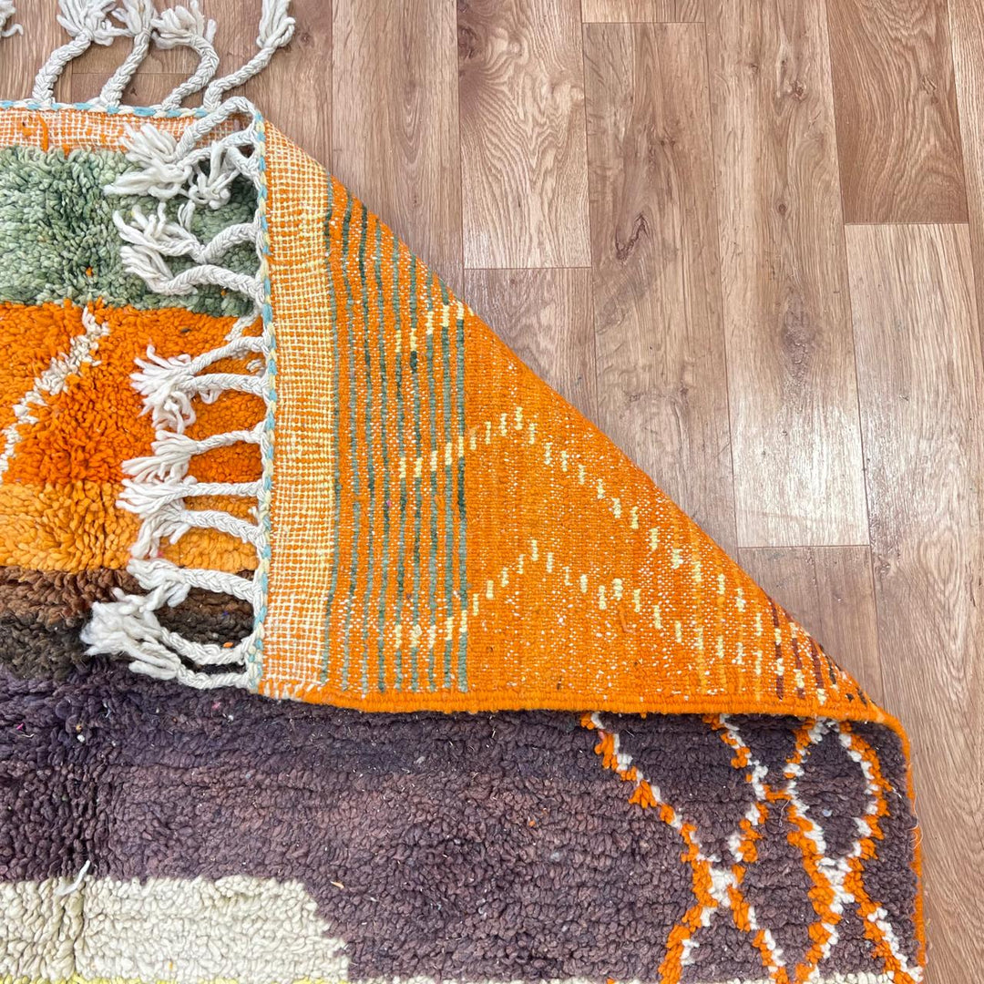 Vintage Moroccan Berber rug with bold abstract stripes in orange turquoise and ivory wool
