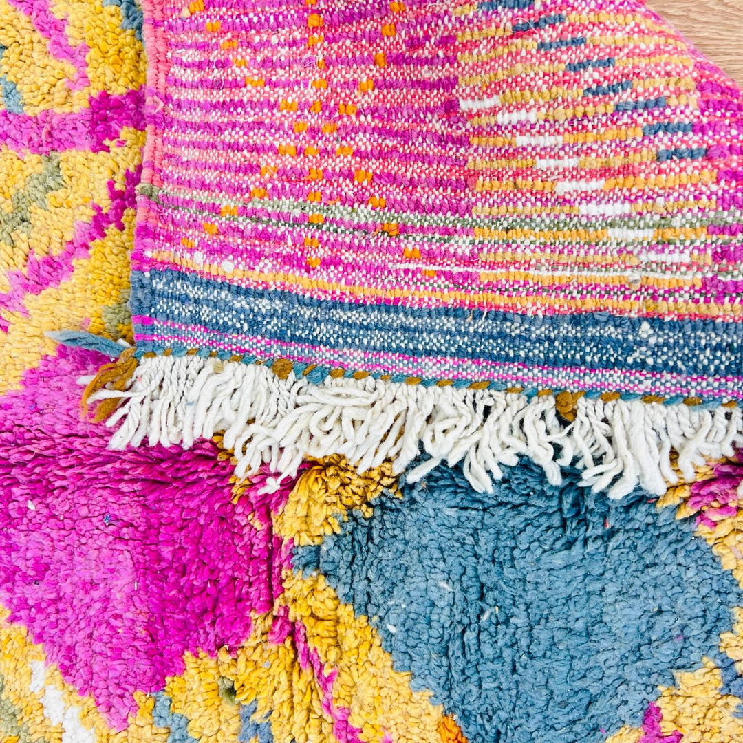 Vintage Moroccan wool rug with colorful geometric Berber pattern, handmade in Morocco