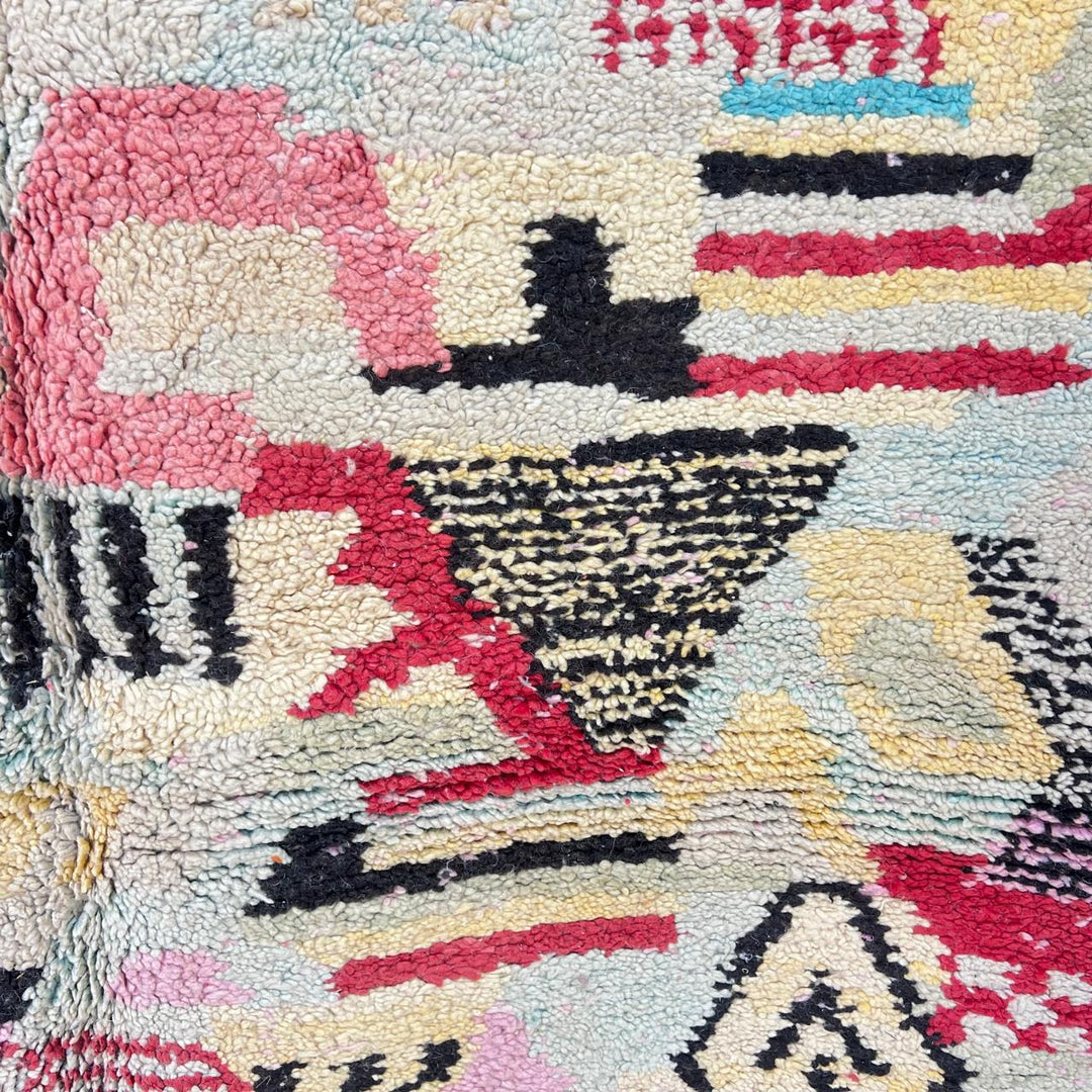 Vintage Moroccan wool rug with colorful patchwork Berber patterns, handmade in Morocco