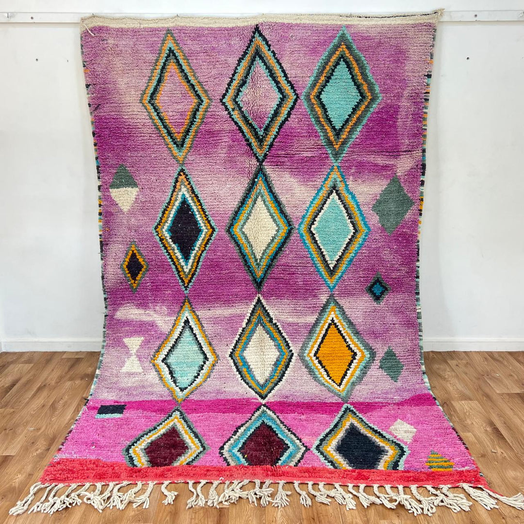 Vintage Moroccan wool rug with purple background and colorful diamond Berber patterns, handmade in Morocco