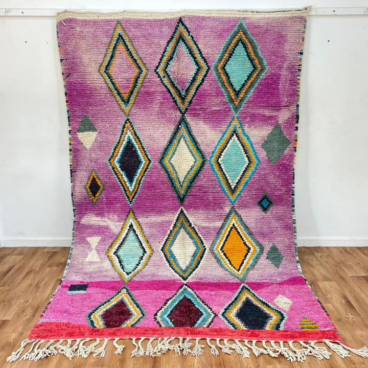 Vintage Moroccan wool rug with purple background and colorful diamond Berber patterns, handmade in Morocco