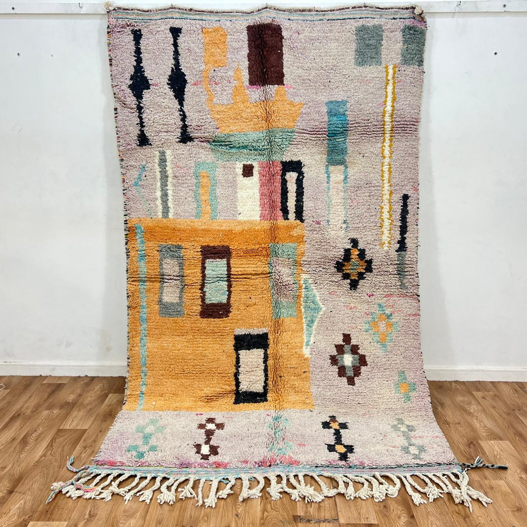 Vintage Moroccan Berber rug with architectural abstract geometric design in ochre and pink wool