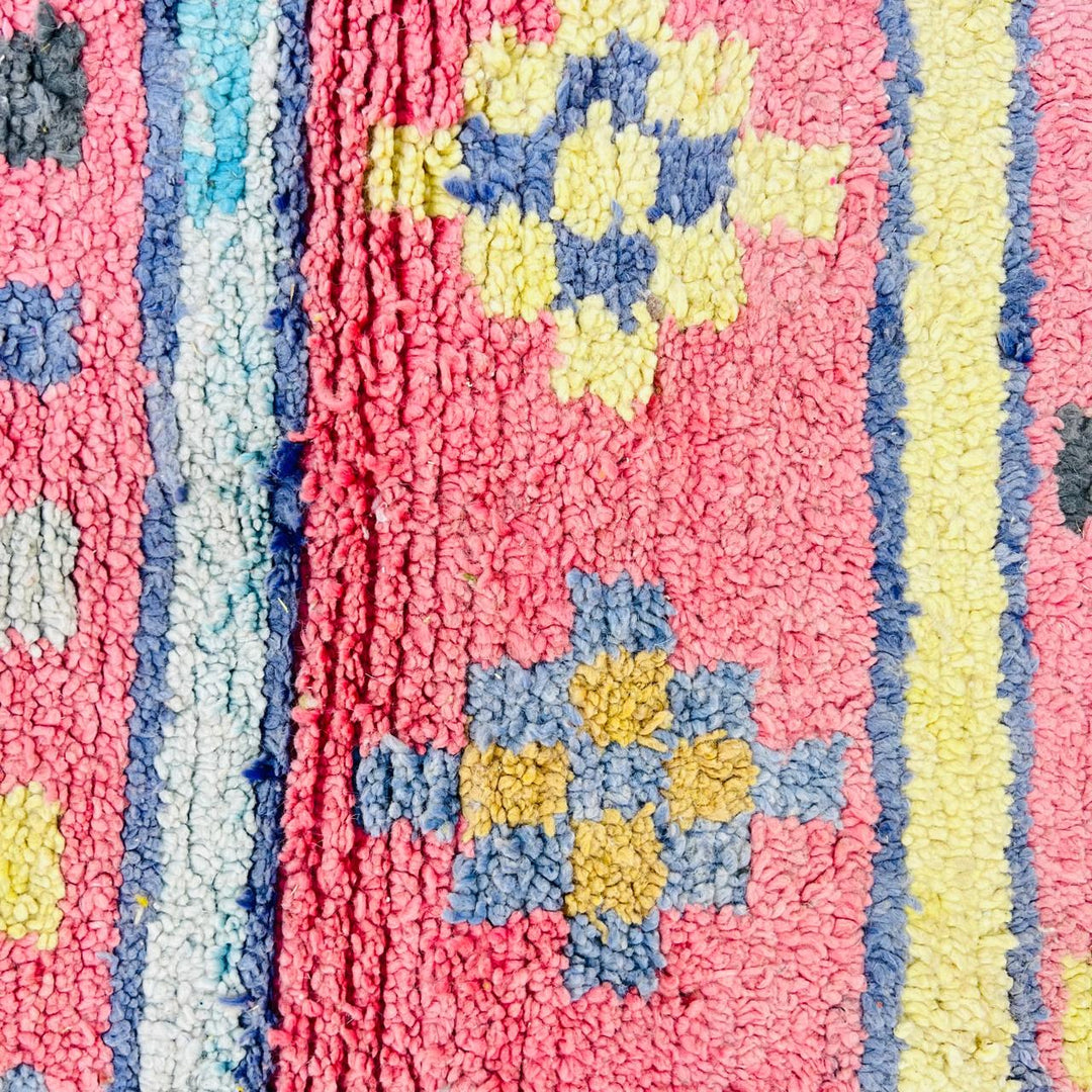 Vintage Moroccan wool rug with colorful Berber geometric patterns, handmade in Morocco