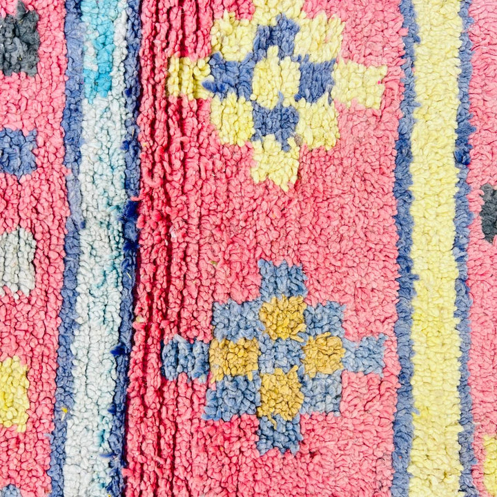 Vintage Moroccan wool rug with colorful Berber geometric patterns, handmade in Morocco