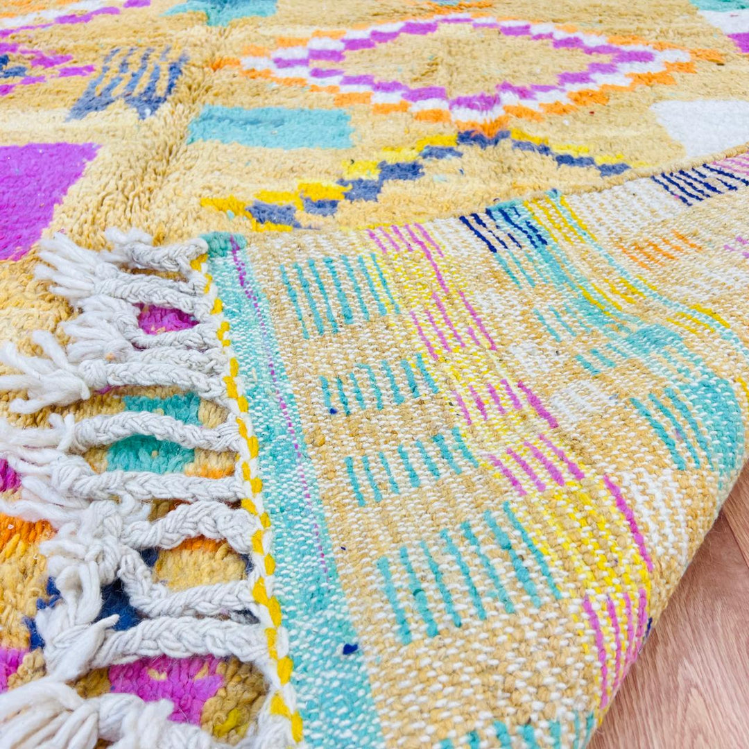 Vintage Moroccan wool rug with mustard yellow base and colorful Berber diamond patterns, handmade in Morocco, size 240x170 cm