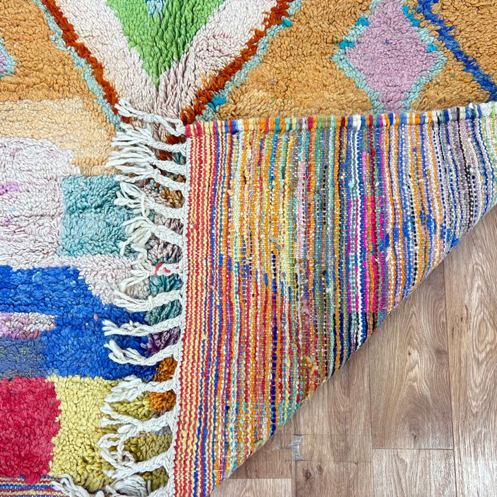 Vintage Moroccan wool rug with colorful Berber diamond patterns, handmade geometric area rug