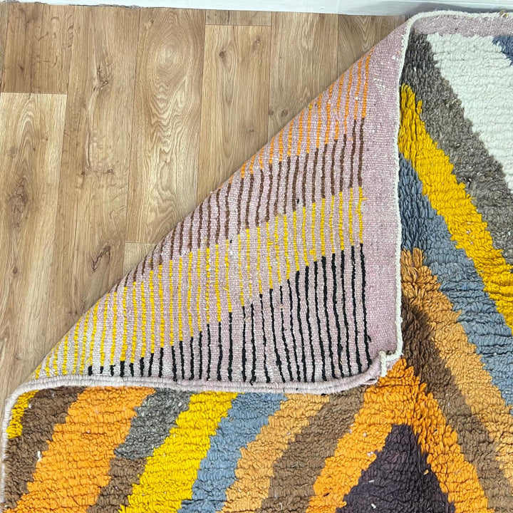 Vintage Moroccan wool rug with chevron tribal pattern in mustard yellow, orange, cream, black and blue, handwoven Berber rug 258x155 cm