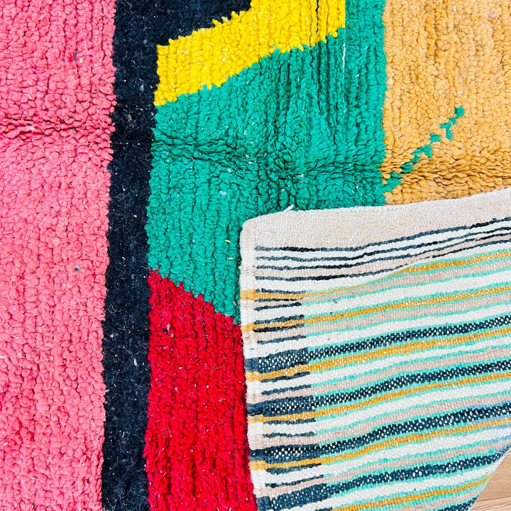 Handmade vintage Moroccan wool rug with colorful geometric Berber design. One-of-a-kind artisan rug, 290×155 cm.