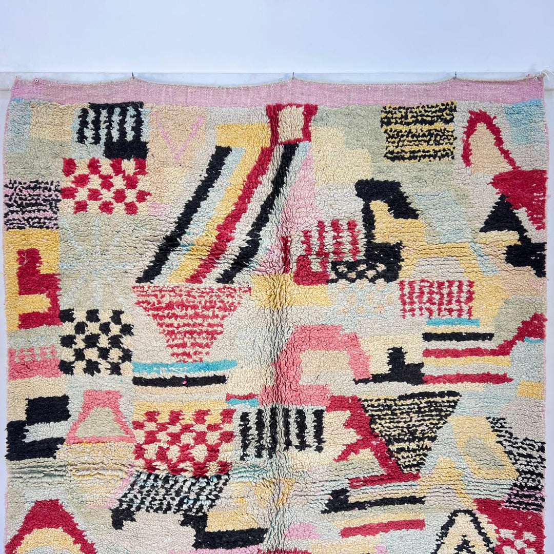 Vintage Moroccan wool rug with colorful patchwork Berber patterns, handmade in Morocco