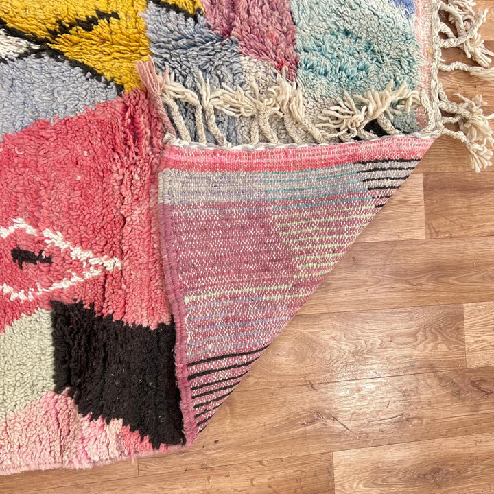 Vintage Moroccan wool rug with abstract Berber pattern in pink, yellow and blue