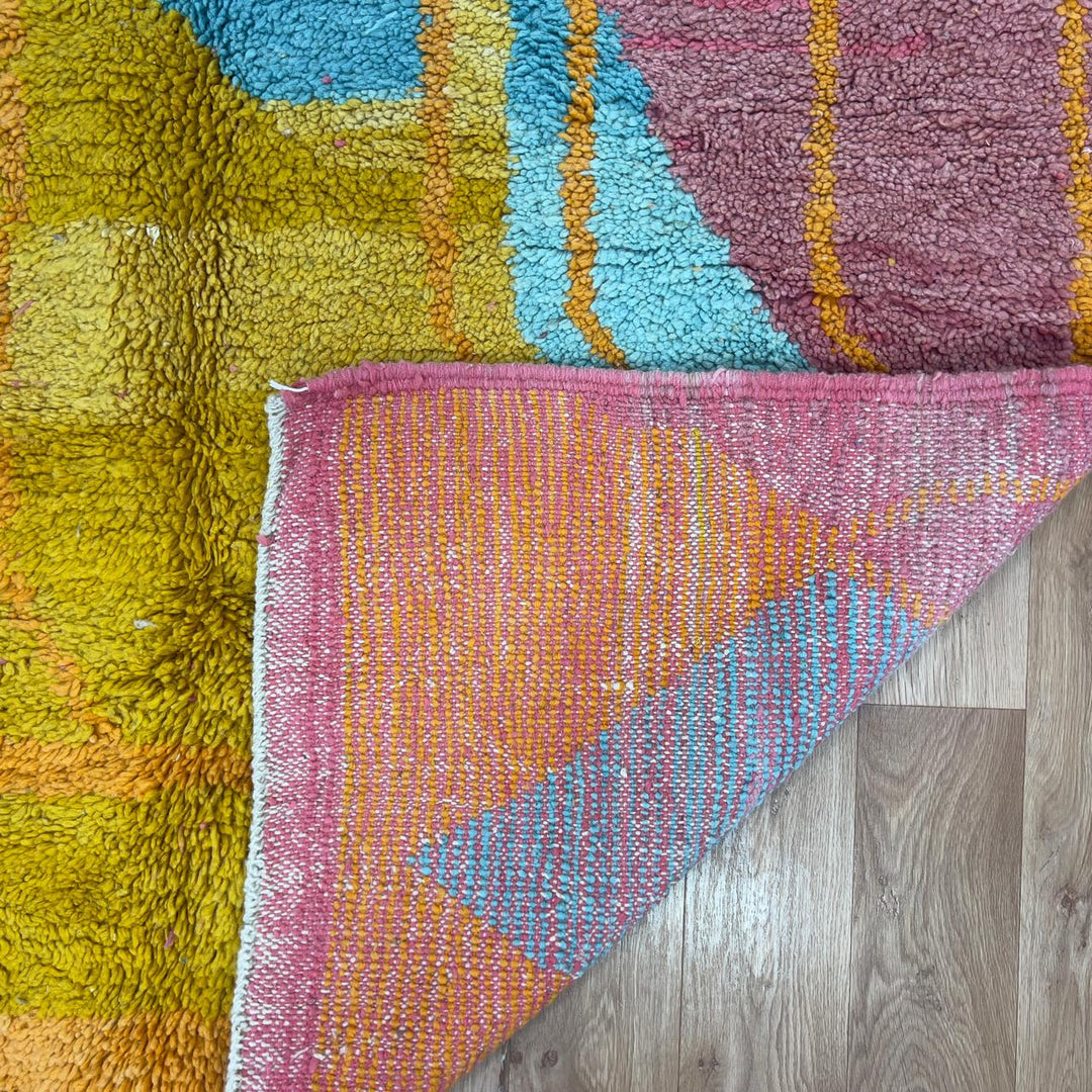 Vintage Moroccan wool rug 7.35x5.41 ft, handmade Berber shag rug with abstract geometric design in mustard yellow, pink and turquoise tones
