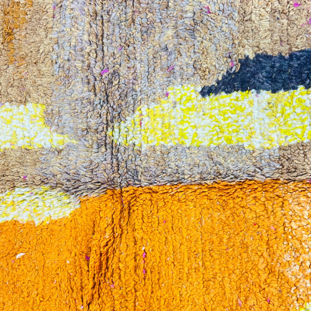 Handmade vintage Moroccan wool rug in pink and yellow with abstract Berber design. One-of-a-kind artisan rug, 255×166 cm.
