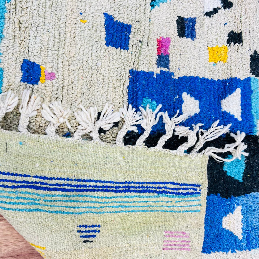 Vintage Moroccan wool rug with colorful geometric Berber pattern, handmade in Morocco