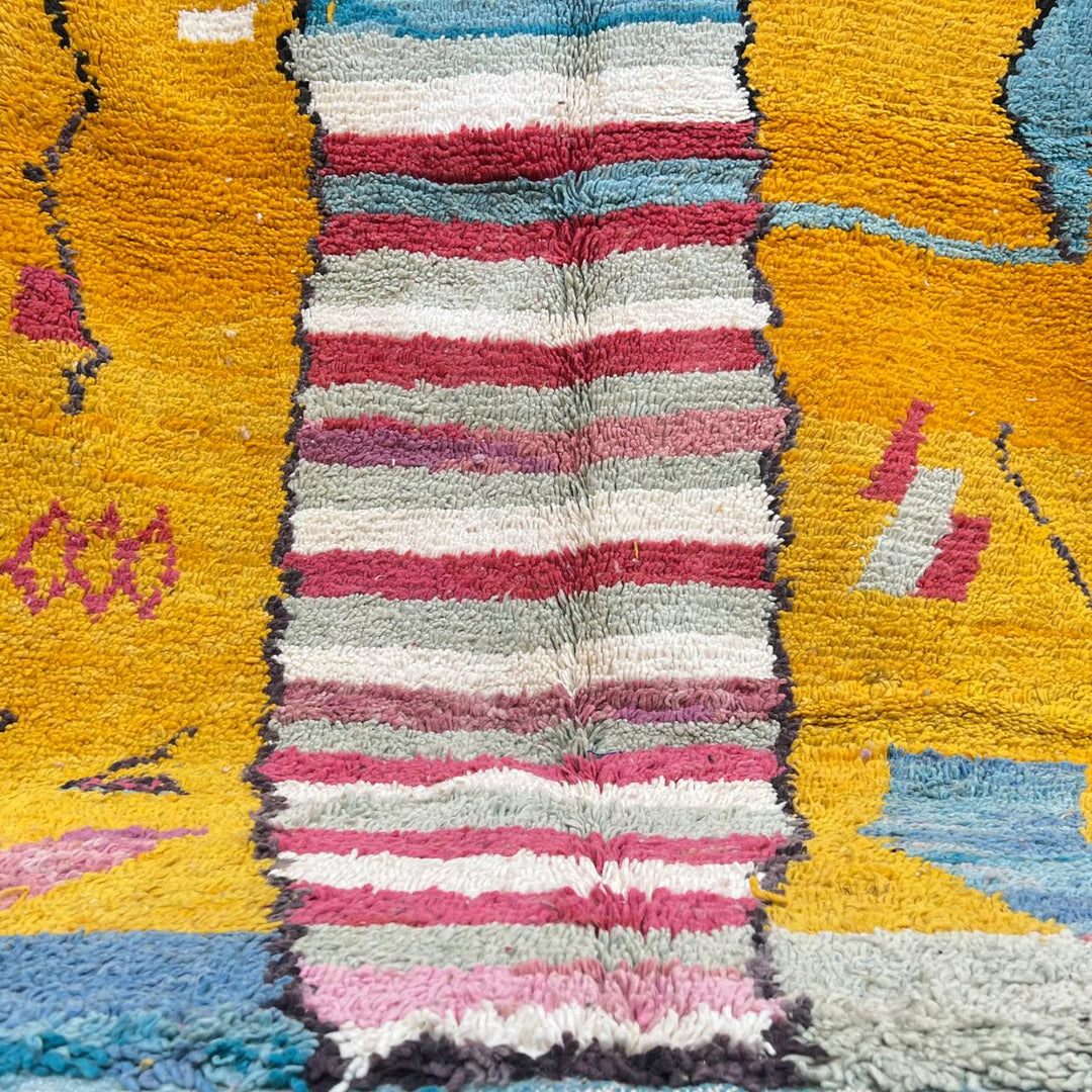 Vintage Moroccan wool rug with mustard yellow background and central striped pastel panel, abstract geometric Berber carpet 265x153 cm