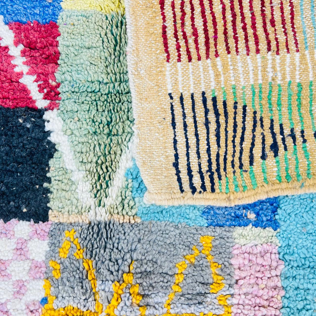 Vintage Moroccan wool rug with colorful patchwork Berber geometric design in pastel tones, handmade in Morocco
