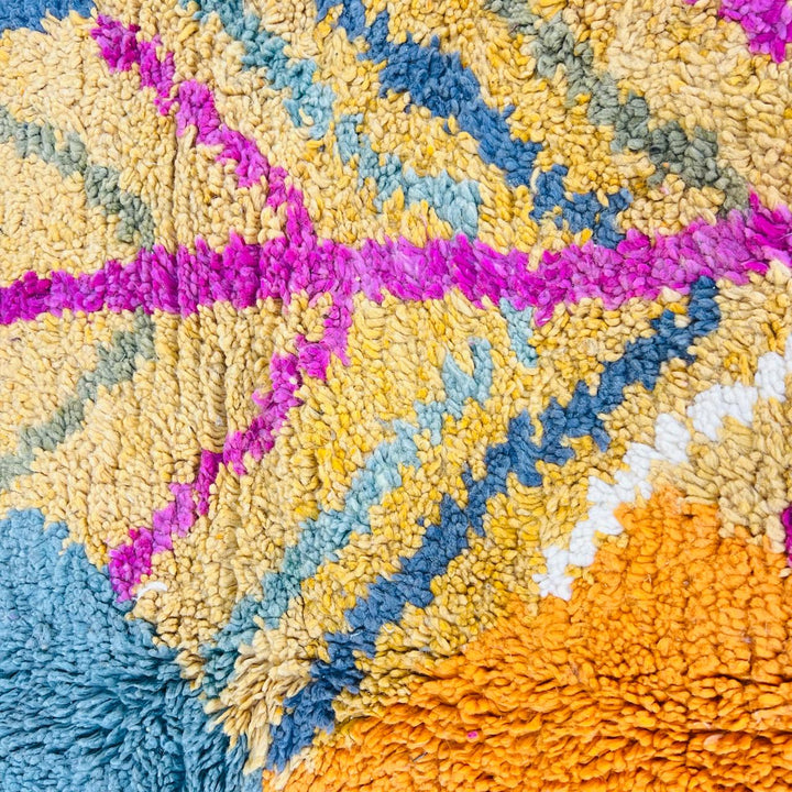 Vintage Moroccan wool rug with colorful geometric Berber pattern, handmade in Morocco
