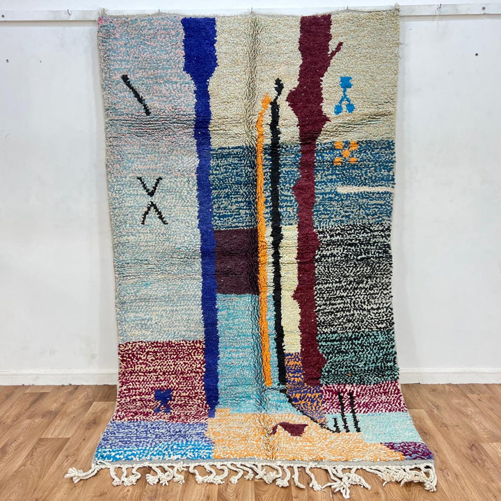 Vintage Moroccan wool rug with abstract vertical stripes in blue, burgundy, cream, and mustard tones