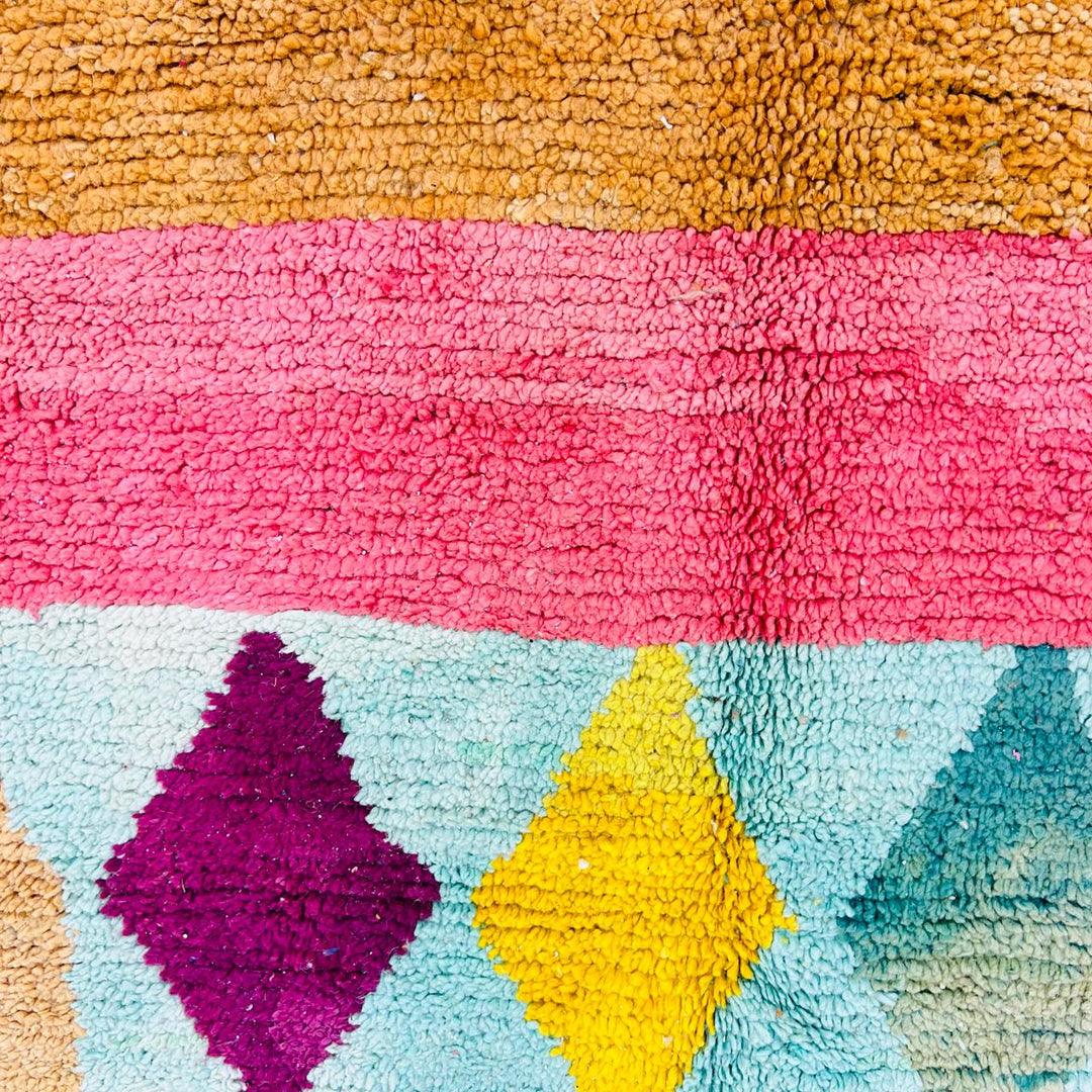 Handmade vintage Moroccan wool rug with colorful geometric Berber design. One-of-a-kind artisan rug, 290×155 cm.