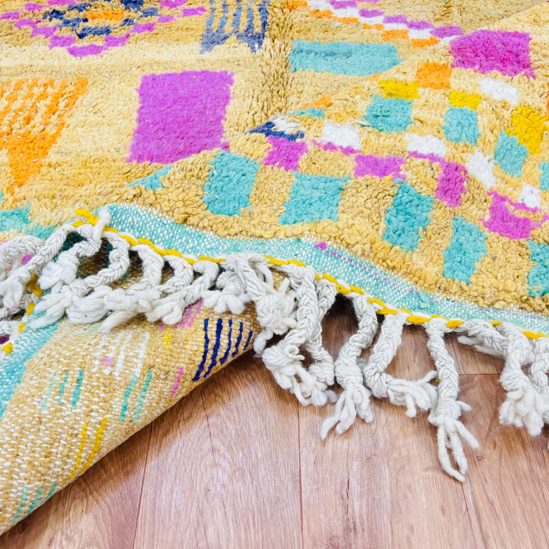 Vintage Moroccan wool rug with mustard yellow base and colorful Berber diamond patterns, handmade in Morocco, size 240x170 cm