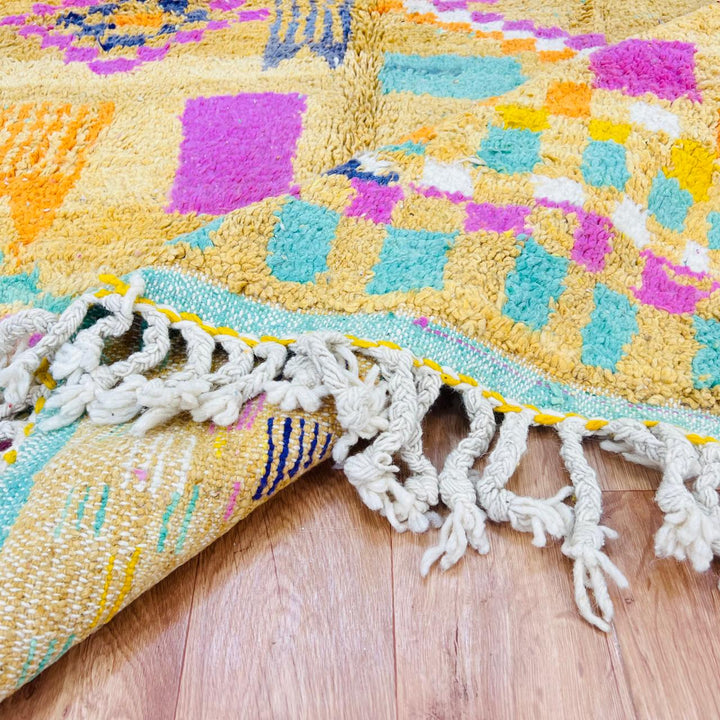 Vintage Moroccan wool rug with mustard yellow base and colorful Berber diamond patterns, handmade in Morocco, size 240x170 cm