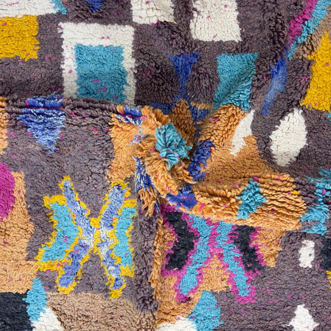 Vintage Moroccan wool rug 8.53x5.68 ft, handmade Berber shag carpet with colorful geometric tribal patterns in brown, pink, blue and mustard tones