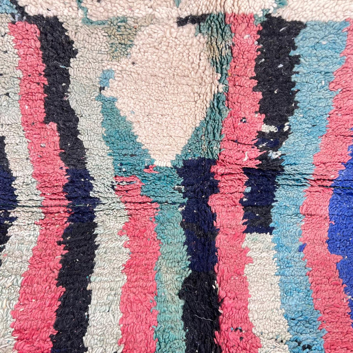Vintage Moroccan wool rug in turquoise and pink tones with tribal Berber patterns, handmade in Morocco