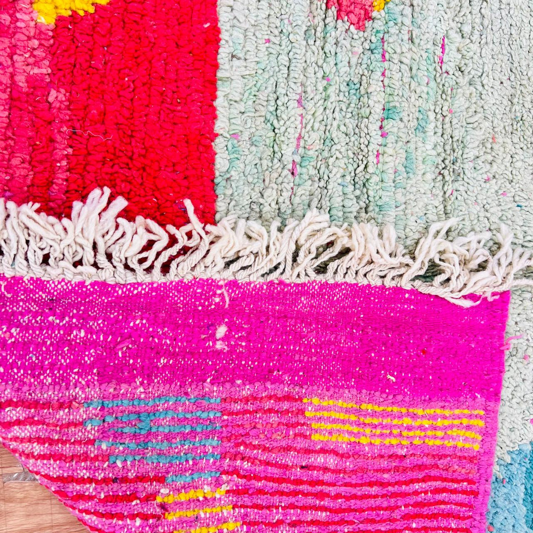 Vintage Moroccan wool rug with colorful abstract Berber design, handmade in Morocco
