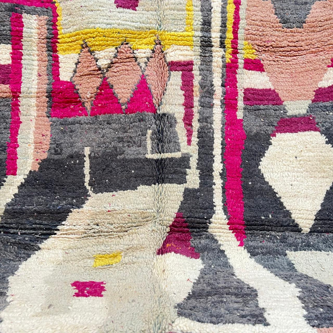 Vintage Moroccan wool rug with colorful abstract Berber geometric design in burgundy, pink, yellow and grey tones