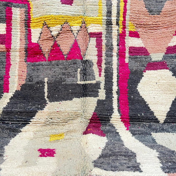 Vintage Moroccan wool rug with colorful abstract Berber geometric design in burgundy, pink, yellow and grey tones