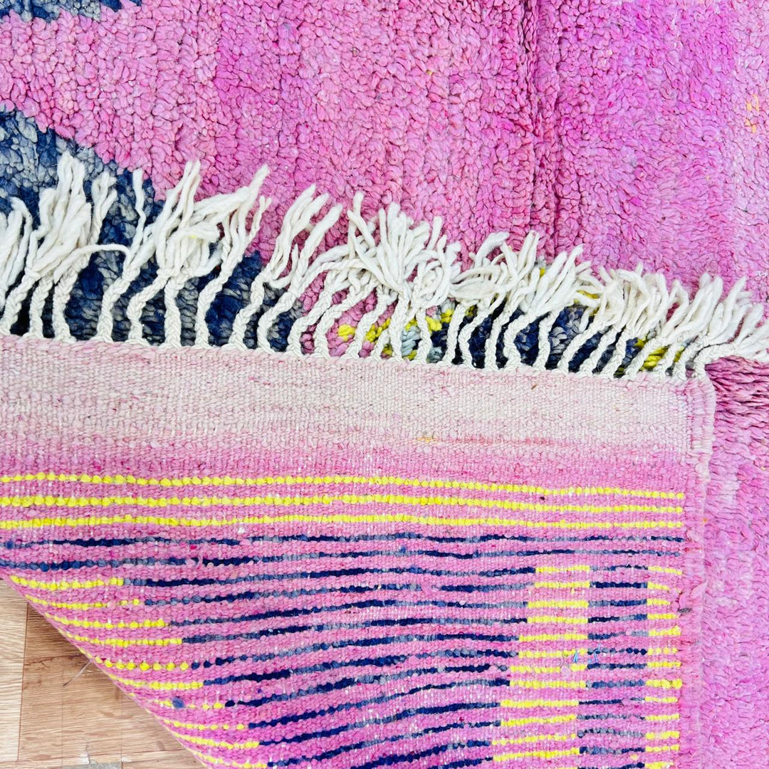 Vintage Moroccan wool rug with colorful geometric Berber pattern, handmade in Morocco
